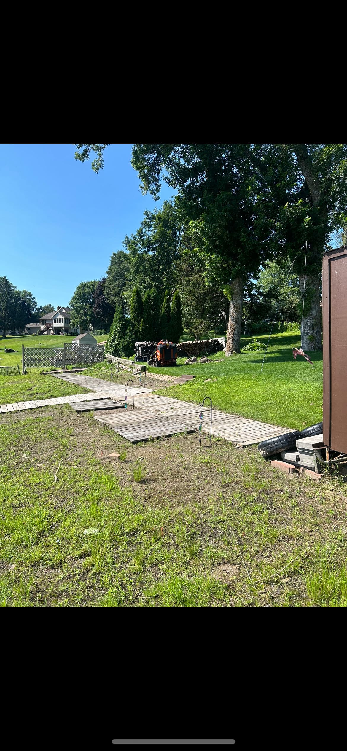 Lakeside Makeover with Boulder Walls and Landscaping