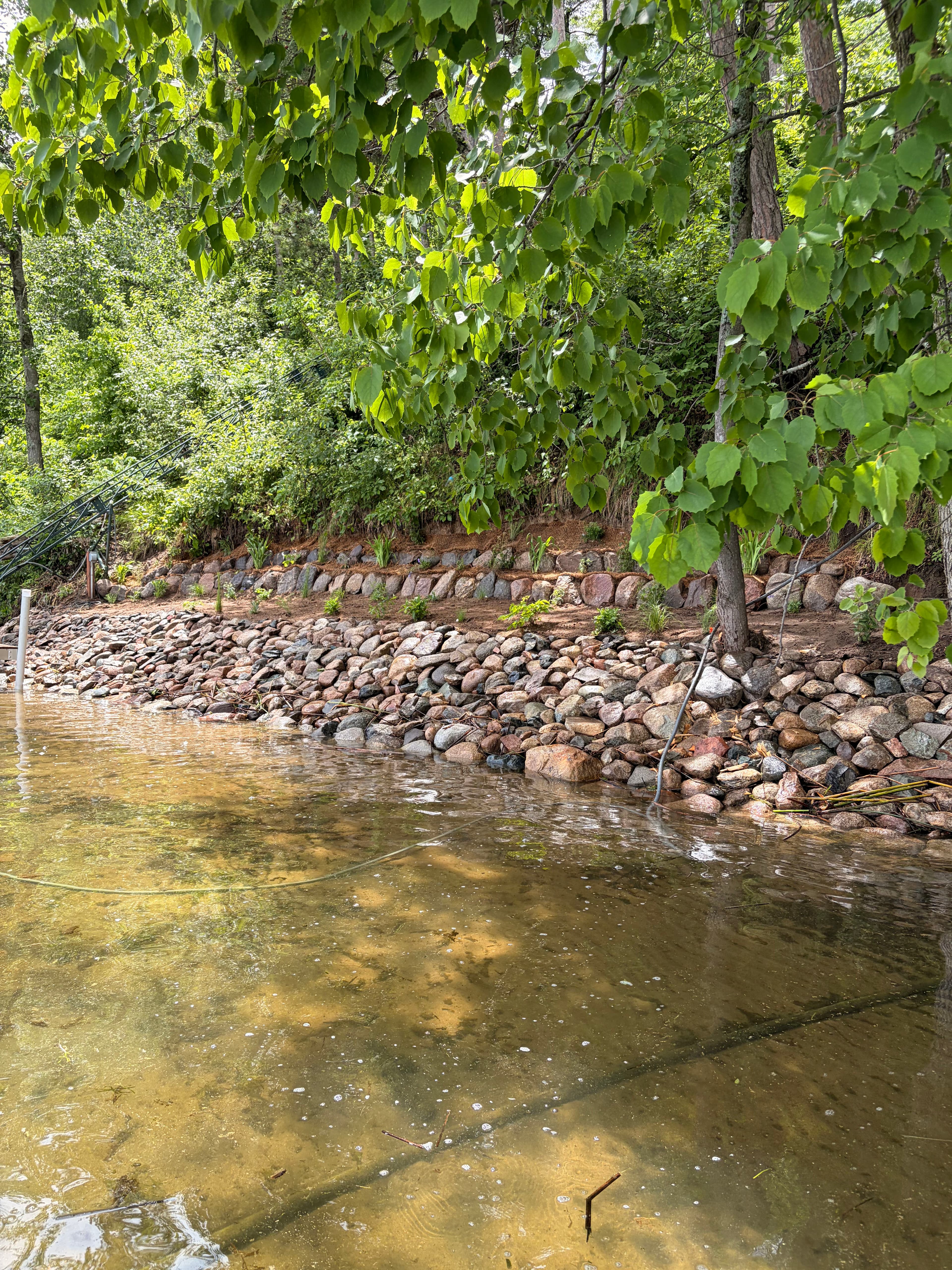 Project Hand-Placed Riprap Shoreline Restoration on a Steep 140-Foot Bluff image