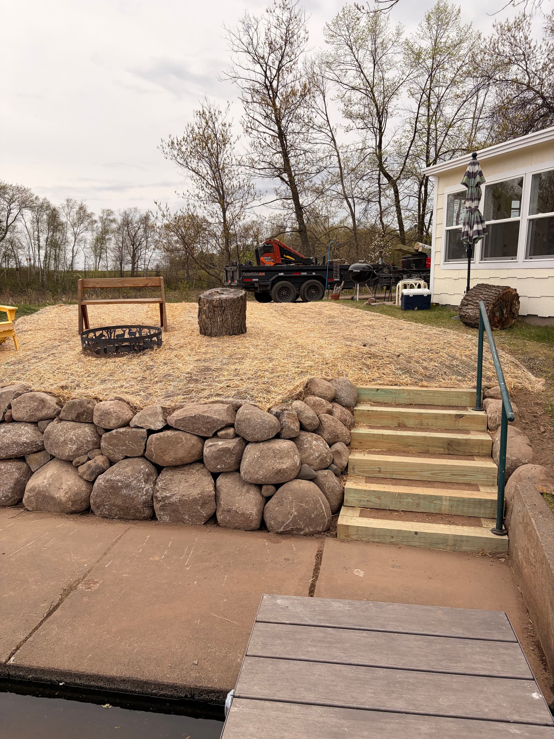 Old Timber Wall Replaced with a Boulder Wall and New Staircase